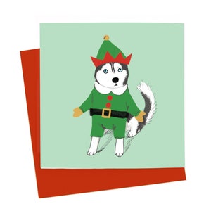 Fantasia engraçada de duende de Natal com cartão de Natal de cachorro Husky