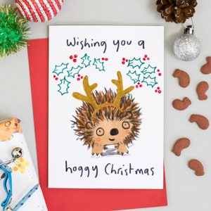 Cartão de Natal do ouriço desejando a você um Natal Hoggy Feliz Natal Ouriço cartão de felicitações chifres de rena