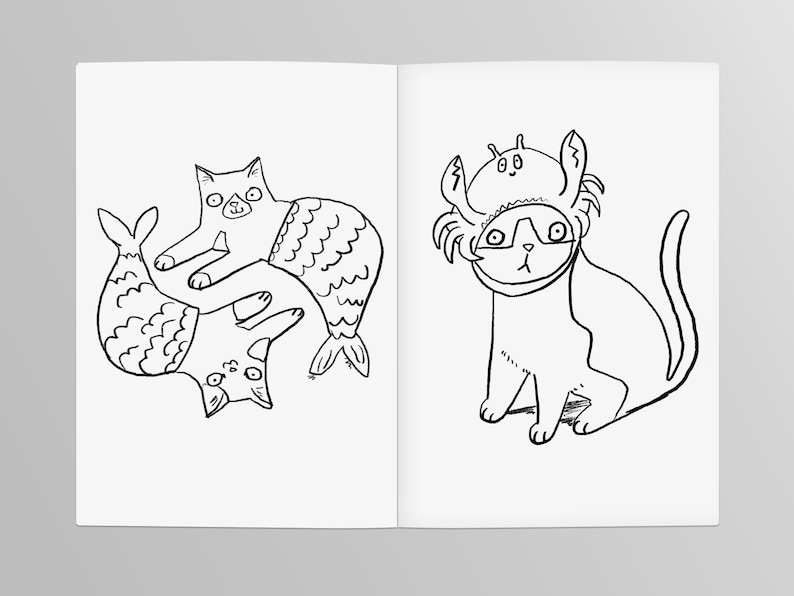 May include: Two black and white line drawings of cats. The first cat is wearing a mermaid tail and is holding another cat with a fish tail. The second cat is wearing a crab costume.