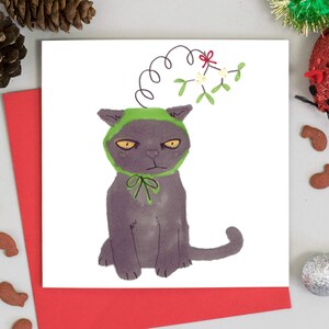 Carte de Noël drôle de chat noir mignon, chat noir dans la carte de chapeau de gui, cartes de vacances drôles de chat, cartes de vacances mignonnes, chats dans des chapeaux de Noël