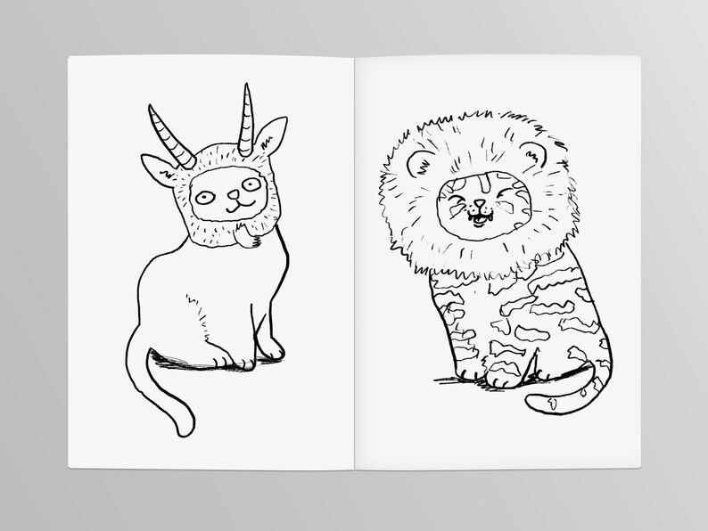May include: A black and white line drawing of a cat wearing a goat costume and a cat wearing a lion costume.