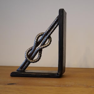 Set of hand-forged bookends, bookends