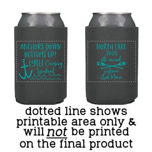 May include: Two gray can coolers with different designs. The first cooler has a teal anchor and the text "Anchors Down Bottoms Up! Lytle Camping Weekend". The second cooler has teal paddles and the text "North Lake 2025 4th annual welcome Leah Marie".