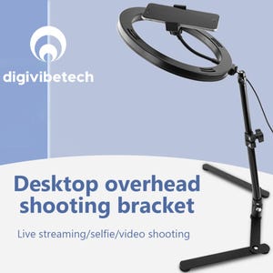May include: Black desktop overhead shooting bracket with a ring light and a phone holder. The bracket has a tripod base and a telescoping arm.  Live streaming/selfie/video shooting.