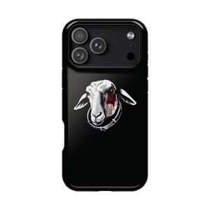 May include: Black phone case featuring a graphic of a sheep's head with a bloody eye and a collar. The sheep is white with black accents, set against a black background. The phone case has a glossy finish.
