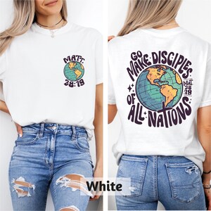 May include: White t-shirt with a front graphic of a globe and the text "MATT 28:19". The back of the shirt features a larger globe graphic and the text "GO MAKE DISCIPLES OF ALL NATIONS MAT 28:19".