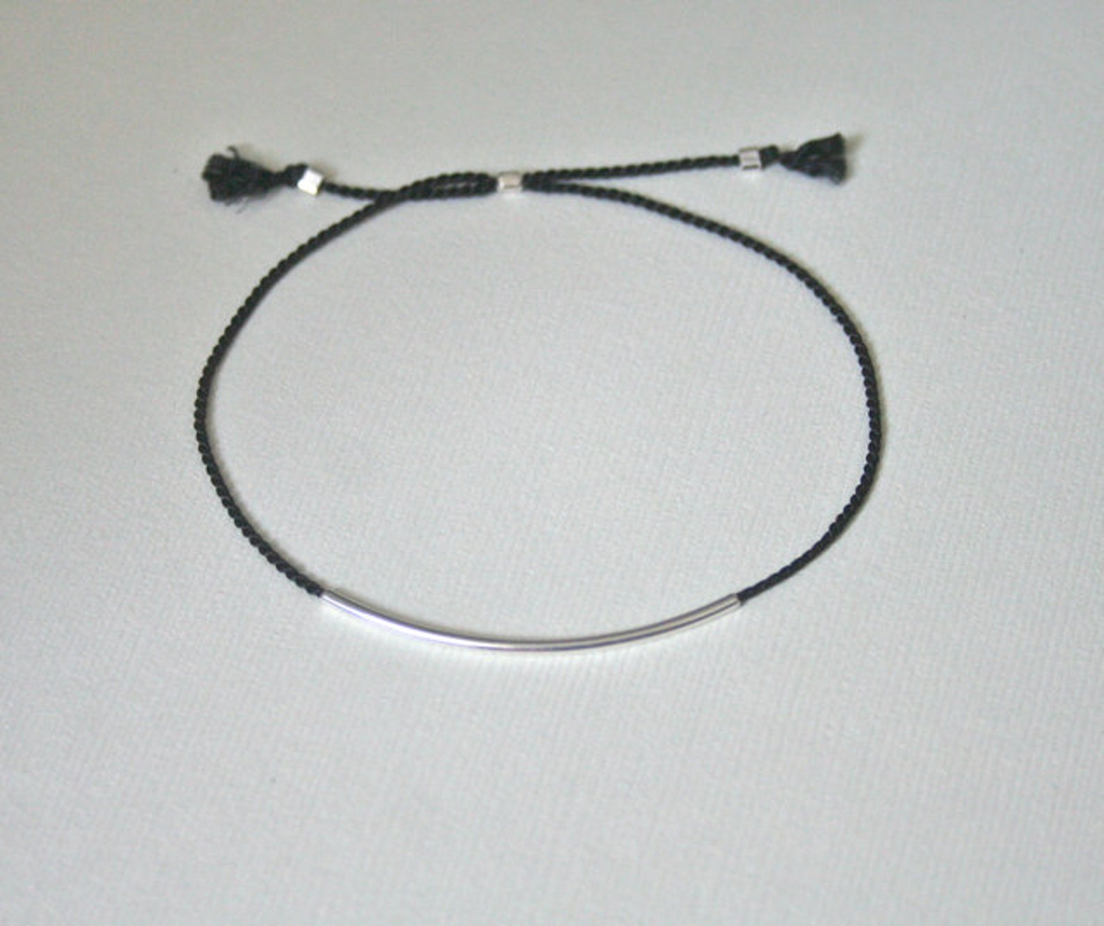 Black thread bracelet - silver buckle