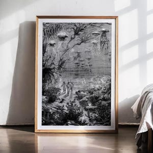 May include: Black and white framed print of an underwater scene with jellyfish and figures. The detailed illustration depicts a dark, mysterious ocean environment with various marine life and plant life. The artwork is framed in a light brown wooden frame.