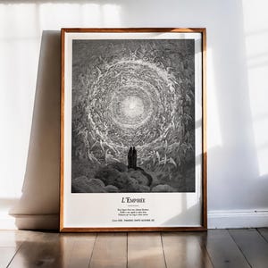 May include: A framed black and white print of a detailed illustration. The artwork depicts a swirling vortex of figures converging towards a bright light. The title "L'EMPIREE" is at the bottom, with additional text below. The frame is a warm brown.