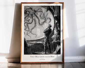 May include: Framed black and white illustration depicting a giant squid attacking a ship, with two figures observing. The artwork is titled "Vingt Mille Lieues sous les Mers" by Jules Verne. The frame is a warm brown color.