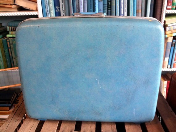 light blue samsonite luggage