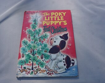 Christmas book lGolden Book The Poky Little Puppy's First Christmas 5th printing 1977 by Adelaide Holl illustrated by Florence S Winship
