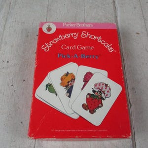 Jogo de cartas Strawberry Shortcake vintage 1979, 1981 Pick-a-Berry da Parker Brothers American Greetings