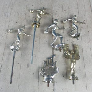 Vintage lot of 6 Gold and Silver Toned Trophy Toppers Cast Metal Heavy 4 are women&#39;s bowling, 1 music notes and one angel