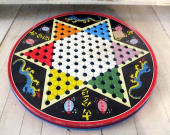 Vintage Ohio Art tin Chinese Checkers and Checker board on the other side Lots of marbles inside