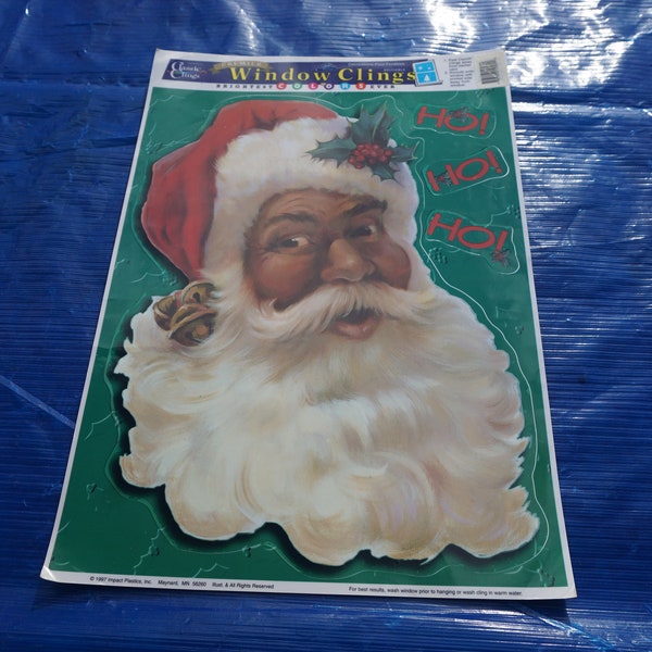 Premier Window Clings 1997 Impact Plastics lot of 2 one sheet with Santa one with stockings Santa Black Children teddy bear bells