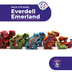 May include: A collection of colorful, die-cut animal stickers for the board game Everdell Emerland. The set includes illustrations of frogs, turtles, beavers, and insects in various poses. The top text reads PACK STICKERS Everdell Emerland.
