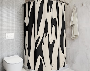 Cortina de ducha moderna con estampado de cebra en negro y beige.