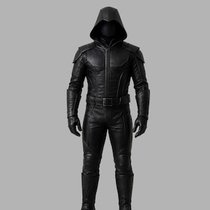 May include: Full-body black leather costume with a hooded cowl. The outfit includes a jacket with shoulder pads, gloves, pants, and boots. A belt cinches the waist. The costume is designed for a sleek, streamlined appearance.