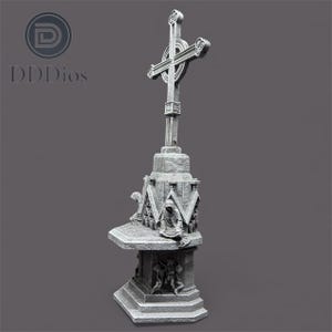 May include: A gray stone cross statue with intricate carvings. The cross is mounted on a detailed pedestal featuring figures and architectural elements. The statue has a weathered appearance, suggesting age and historical significance.