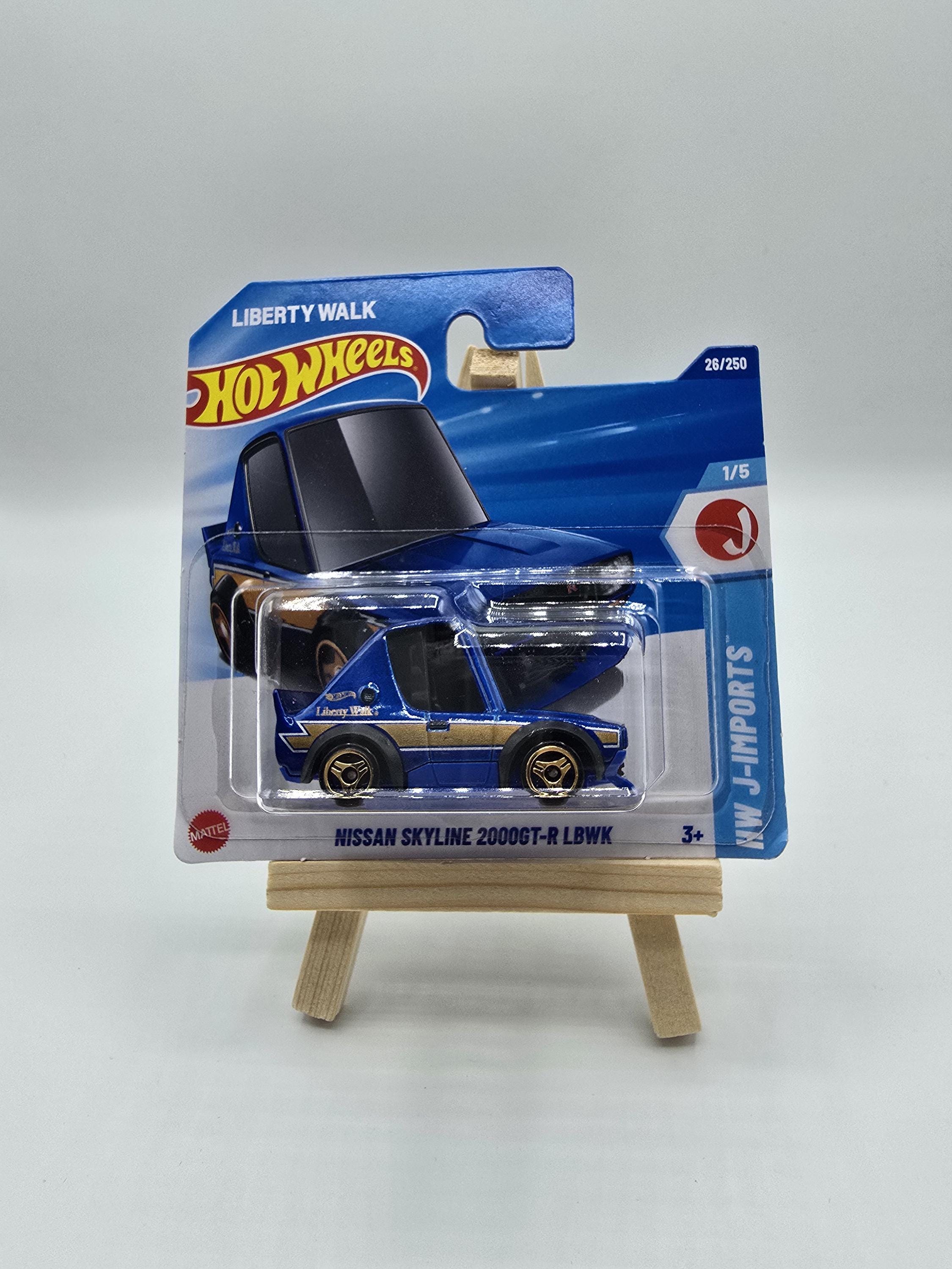 Xe Mô Hình Nissan Skyline 2000GT-R ( KPGC10 ) 1:64 Kyosho ( Trắng