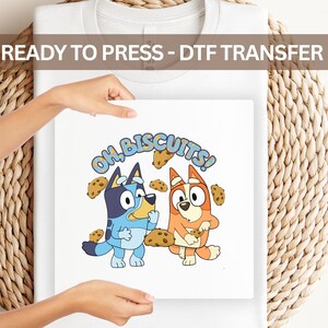 Oh Biscuits Blue Dog BingoDTF Transfer – Cute Cartoon Puppy Design for Kids Shirts, Heat Press Ready Birthday Print