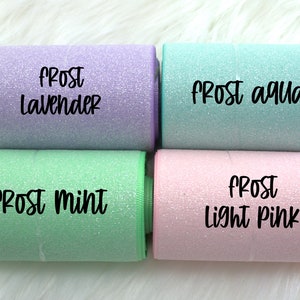 May include: Four rolls of glitter ribbon in different colors: frost lavender, frost aqua, frost mint, and frost light pink.