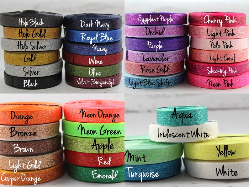 May include: Assortment of colorful glitter ribbon rolls in various colors, including black, gold, silver, navy, blue, purple, pink, orange, green, red, white, and yellow. The ribbon rolls are arranged in rows and labeled with their respective colors.