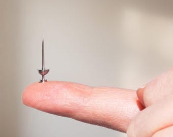 Kleine punaises • Miniatuur stalen kurkbordpinnen