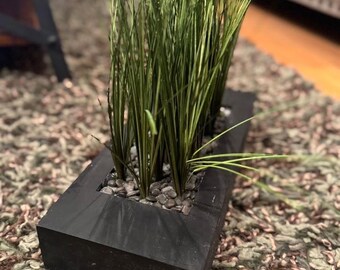 Decorative faux grass plant