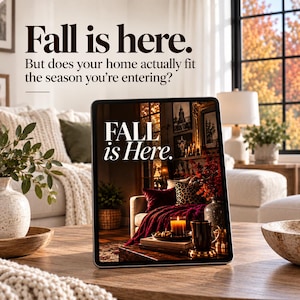 May include: A tablet displaying an image of a cozy living room with the text "FALL is Here." The screen shows a dark, warm interior with a lit candle, a mug, and a red throw blanket. The surrounding text reads "Fall is here. But does your home actually fit the season you’re entering?"