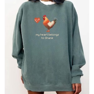Comfort Colors®, Unisex Stardew Valley Chicken Sweatshirt, Pelican Town shirt, Trendy Sweatshirt, Gamer gift, Stardrop saloon, Shane