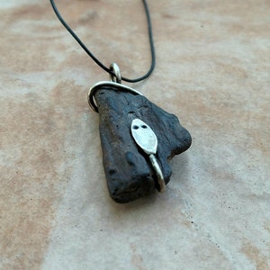 Wood Snake This pendant features a piece of Petrified Wood that has a Silver Snake coiled around it. image 3
