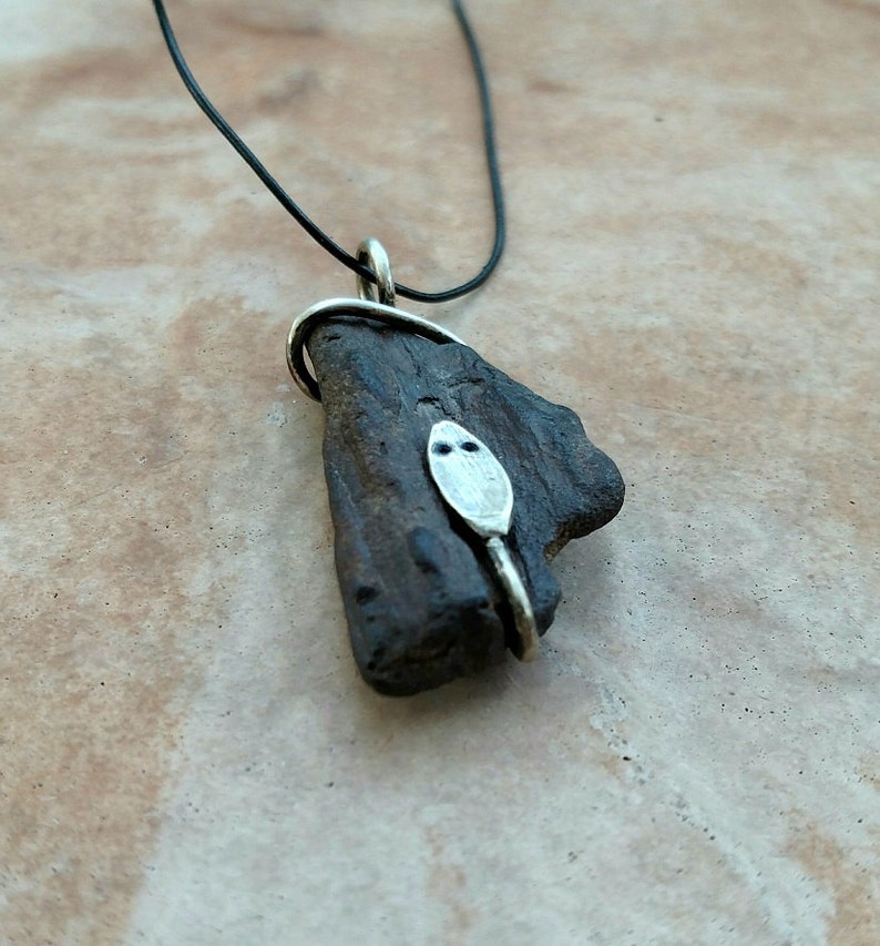 Wood Snake This pendant features a piece of Petrified Wood that has a Silver Snake coiled around it. image 3