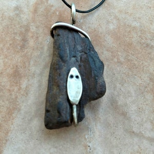 Wood Snake This pendant features a piece of Petrified Wood that has a Silver Snake coiled around it. image 4