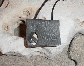 Signs- This small Wisdom Pouch is made out of Cream and Gray Deerskin leather with carved symbols and it comes on an adjustable cord.