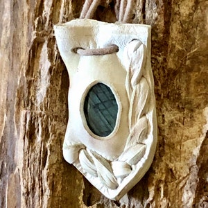 Labradorite & Leather Pod Heaven Speak This Wisdom Pod is made out of creamy white deer skin leather and contains a Labradorite cabochon. image 2