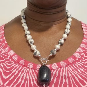 Handcrafted Ceramic Bead Pendant Necklace: Black White Swirl, Silver Toggle