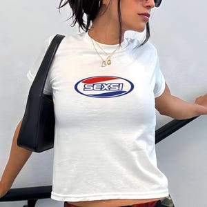 Trendy Graphic Tee, Funny Women's T-Shirt, Cool Casual Top, Stylish White Shirt, Bold Statement Tee, Comfortable Everyday Wear