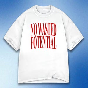 May include: A white t-shirt with the red text "NO WASTED POTENTIAL" printed on the front. The shirt has short sleeves and a crew neck. The text is in a bold, sans-serif font.