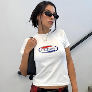 Trendy White Graphic Tee, Fun Bold Text Unisex Shirt, Retro Style Fashion, Casual Cool Youth Outfit, Stylish Urban Streetwear