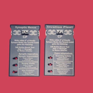 May include: Two gray game cards with text, "Synaptic Nexus" and "Invation Fleet", on a red background. Each card displays game information, including "CP" and various game effects. The cards have a series of red toggle switches.