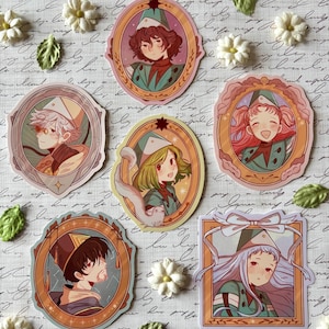 May include: A collection of six illustrated stickers featuring anime-style characters in ornate frames. The characters have varying hair colors and expressions, wearing green and teal outfits. The stickers are surrounded by white flowers and green leaves.