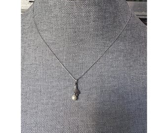 Vintage Victorian Revival Hand Holding a Pearl Sterling Silver Pendant Necklace