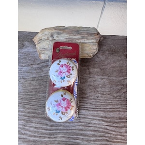 May include: A set of three ceramic mugs with a speckled, matte finish. The mugs are in shades of cream, light brown, and dark brown. Each mug has a simple, minimalist design, perfect for coffee or tea.