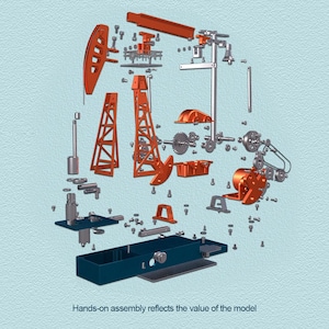 May include: An exploded diagram of an oil derrick model, showing orange and silver components. The model is taken apart, with gears, beams, and a base scattered. The text "Hands-on assembly reflects the value of the model" is visible.