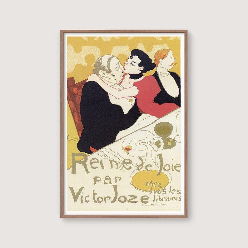 May include: A framed vintage poster titled "Reine de Joie" by Victor Joze. The artwork depicts three figures in a restaurant setting, with a couple embracing and a third person observing. The poster has a yellow and gold color scheme.