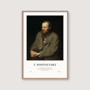 May include: A framed print featuring a portrait of F. Dostoevsky. The image shows a man with a long beard and a serious expression, wearing a coat. Below the image, the name "F. DOSTOEVSKY" is printed, along with a quote about the meaning of life.
