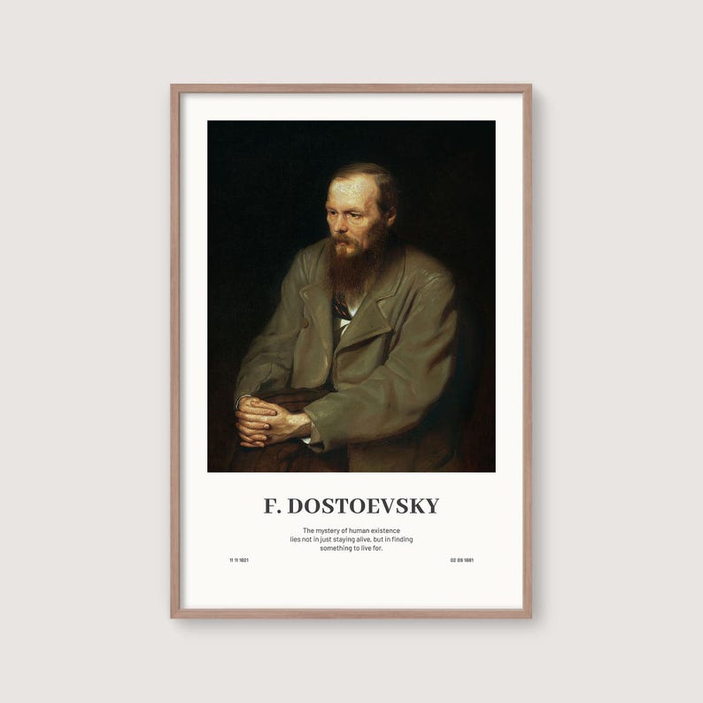 May include: A framed print featuring a portrait of F. Dostoevsky. The image shows a man with a long beard and a serious expression, wearing a coat. Below the image, the name "F. DOSTOEVSKY" is printed, along with a quote about the meaning of life.