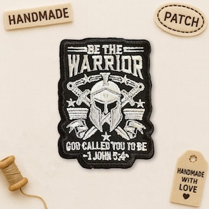 May include: Black embroidered patch with the text "BE THE WARRIOR" and "GOD CALLED YOU TO BE - 1 JOHN 5:4". The patch features a Spartan helmet, swords, and stars. Includes "HANDMADE" and "PATCH" tags.